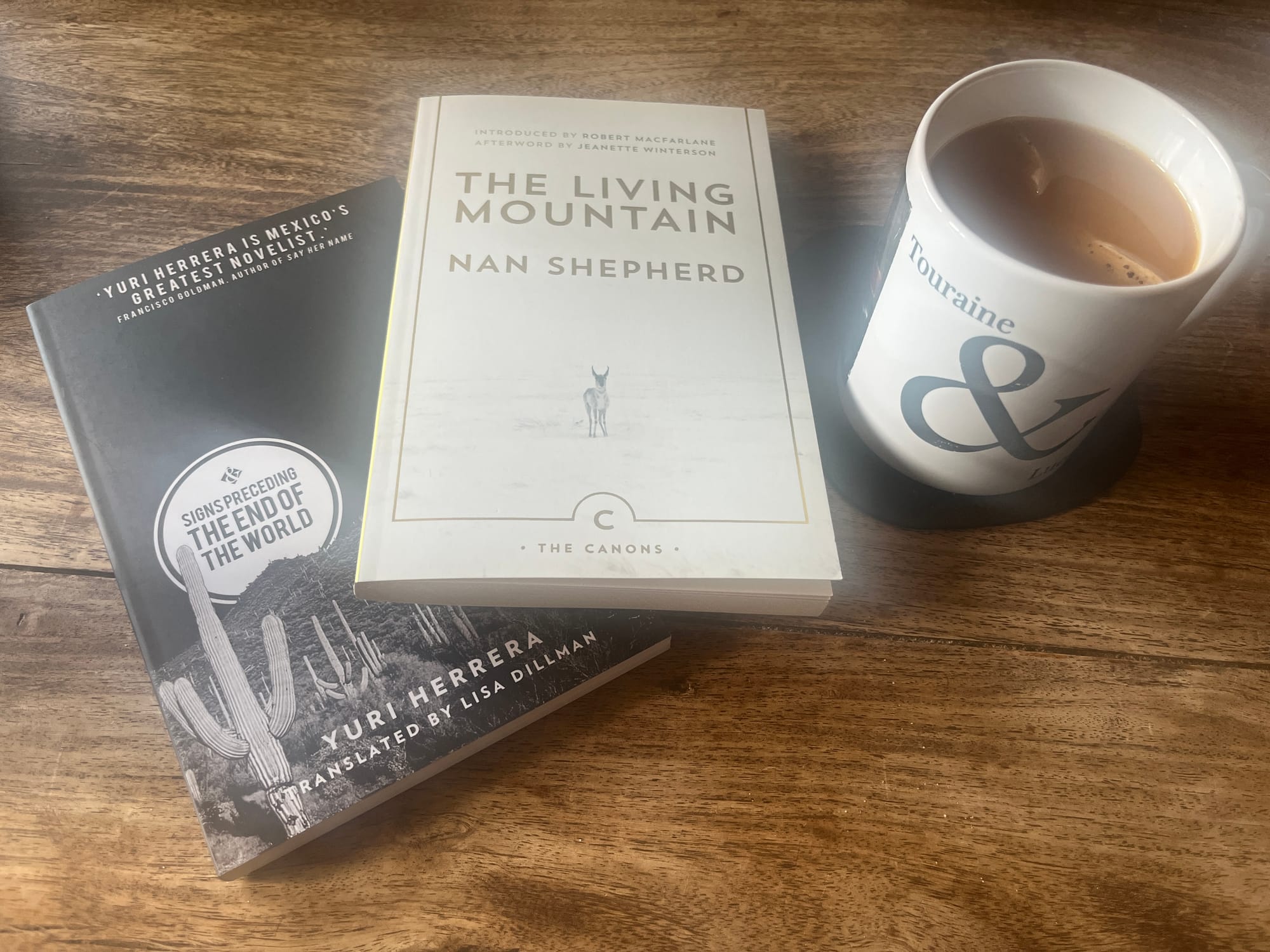Two books and a mug of tea.